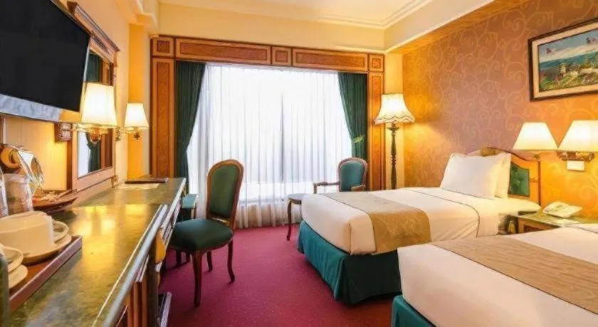 Bed in Gajahmada Graha Hotel