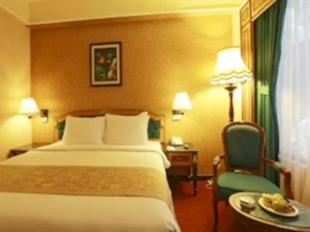 Bed in Gajahmada Graha Hotel