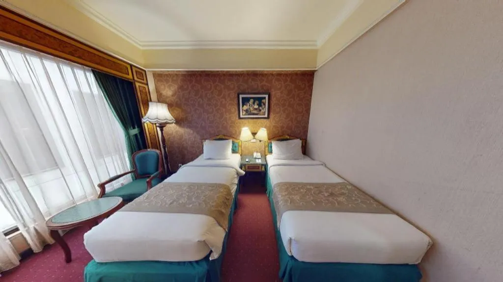 Bed in Gajahmada Graha Hotel