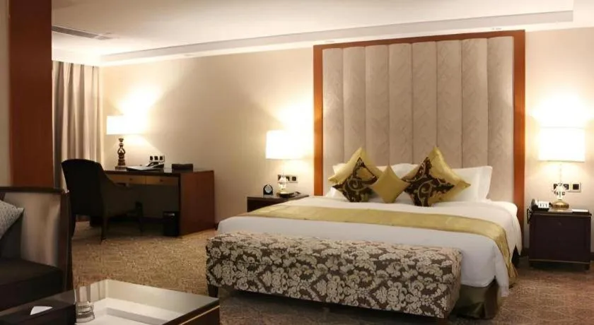 Bed in Yihe Grand Hotel