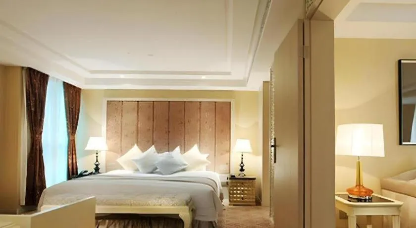 Bed in Yihe Grand Hotel