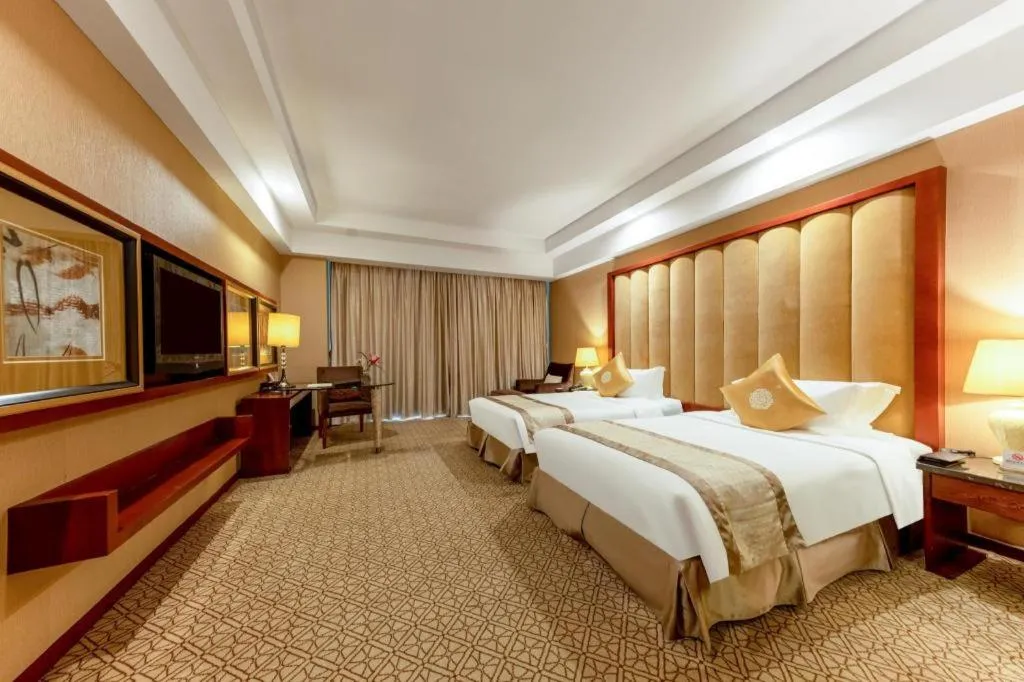Bed in Yihe Grand Hotel