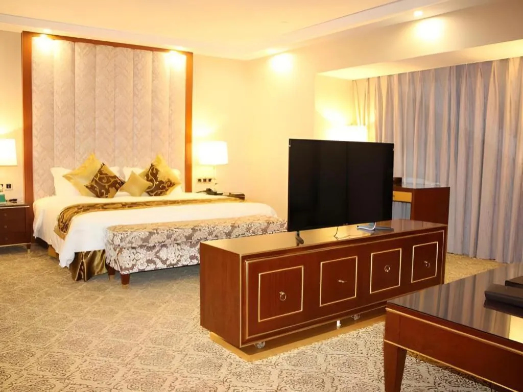 Bed in Yihe Grand Hotel