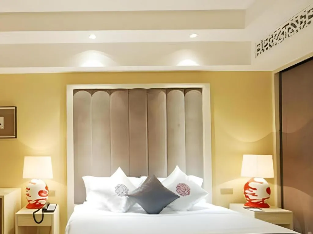 Bed in Yihe Grand Hotel