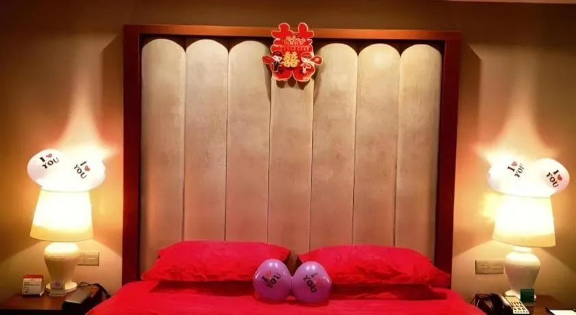 Bed in Yihe Grand Hotel