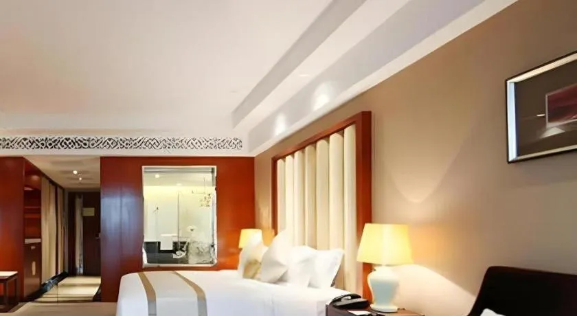 Bed in Yihe Grand Hotel