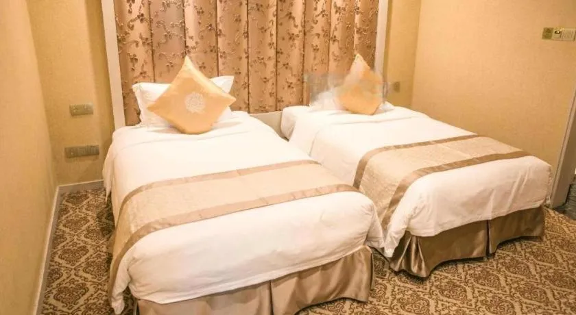 Bed in Yihe Grand Hotel