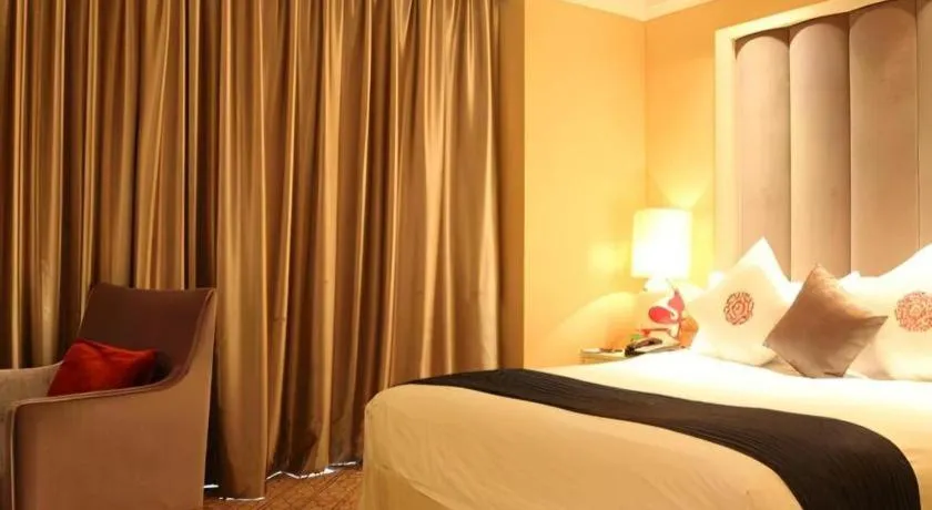 Bed in Yihe Grand Hotel