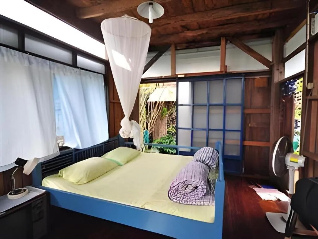 Bed in Baan ChanKhiang at ChiangKhan