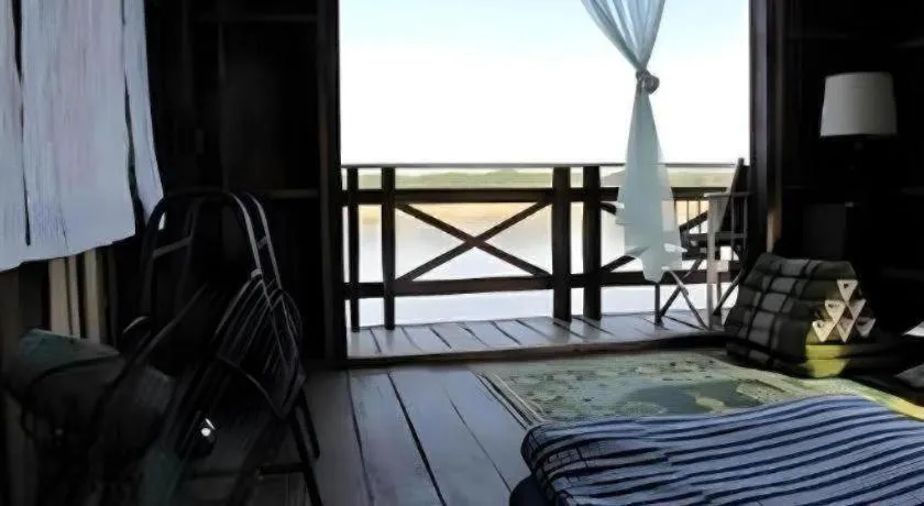 Bed in Baan ChanKhiang at ChiangKhan