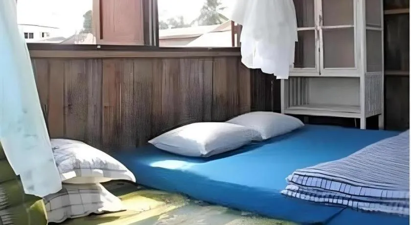 Bed in Baan ChanKhiang at ChiangKhan