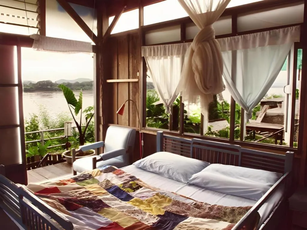 Bed in Baan ChanKhiang at ChiangKhan