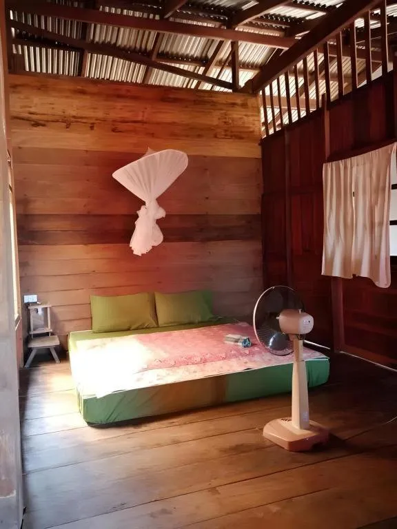Bed in Baan ChanKhiang at ChiangKhan