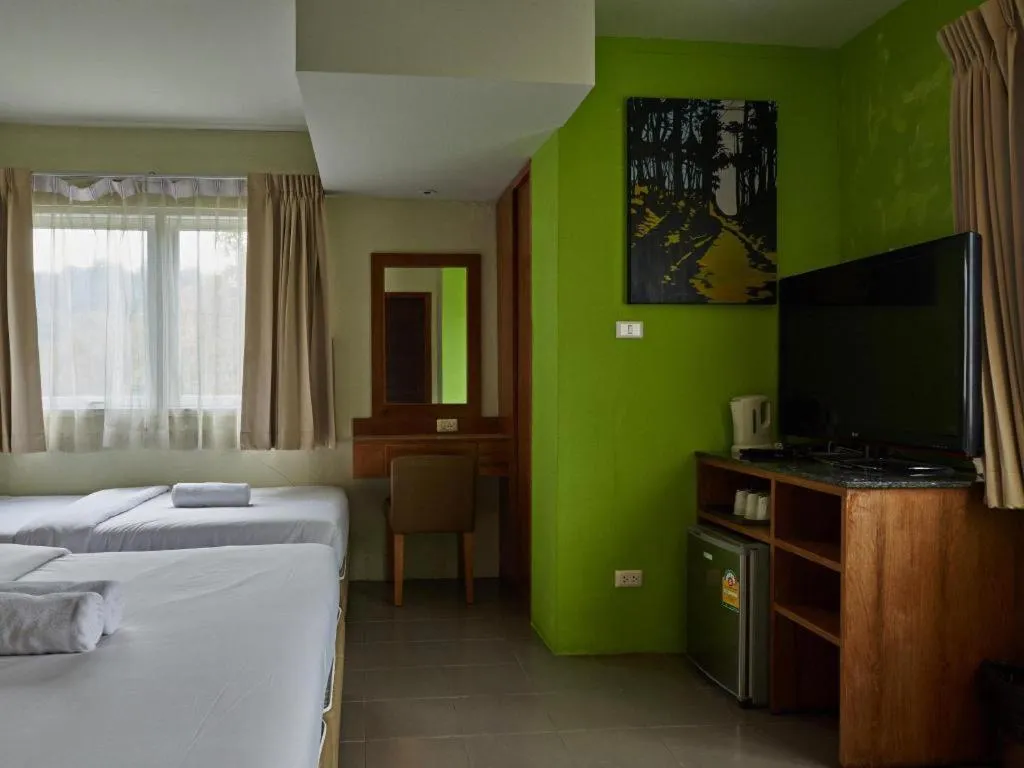 Bed in Phuket Ecozy Hotel