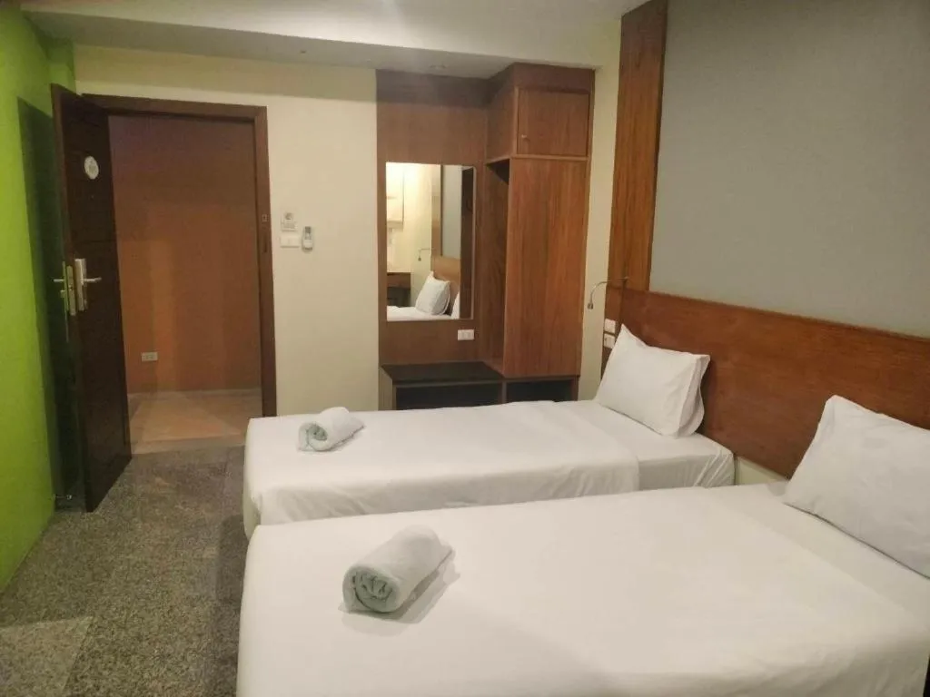 Bed in Phuket Ecozy Hotel