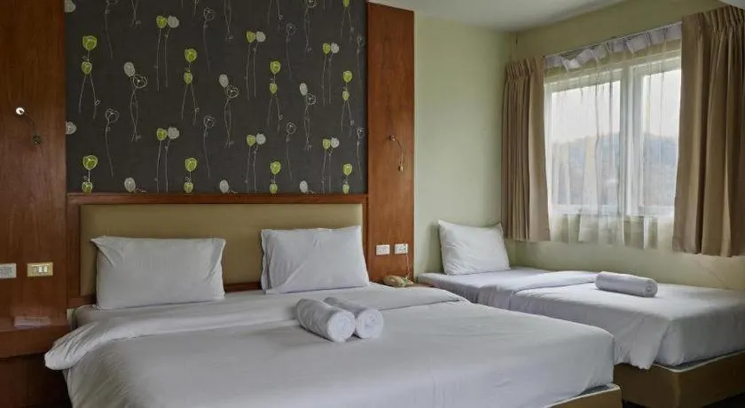 Bed in Phuket Ecozy Hotel