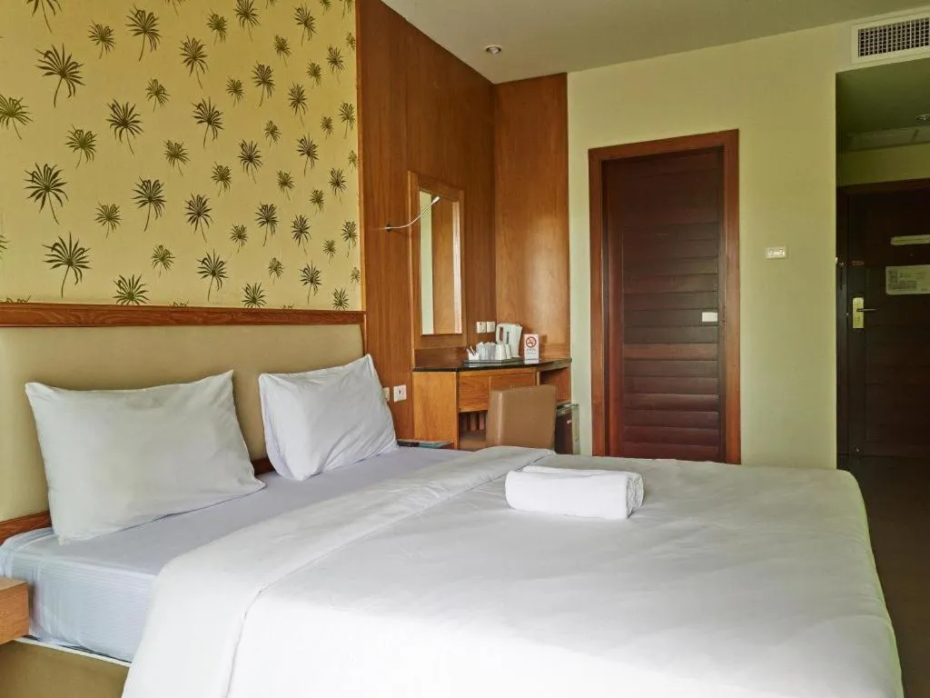 Bed in Phuket Ecozy Hotel