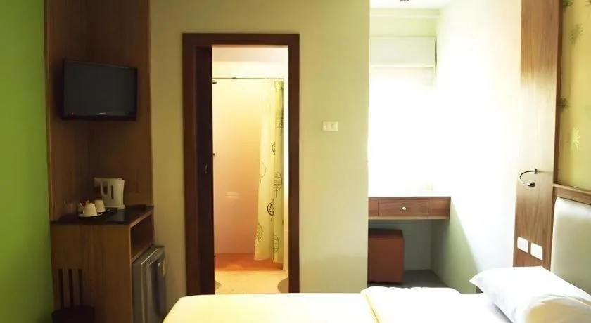 Bed in Phuket Ecozy Hotel