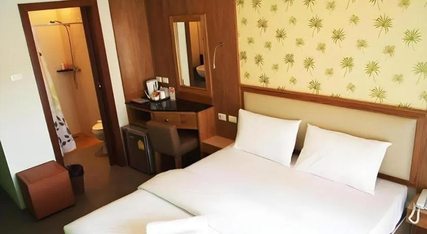 Bed in Phuket Ecozy Hotel