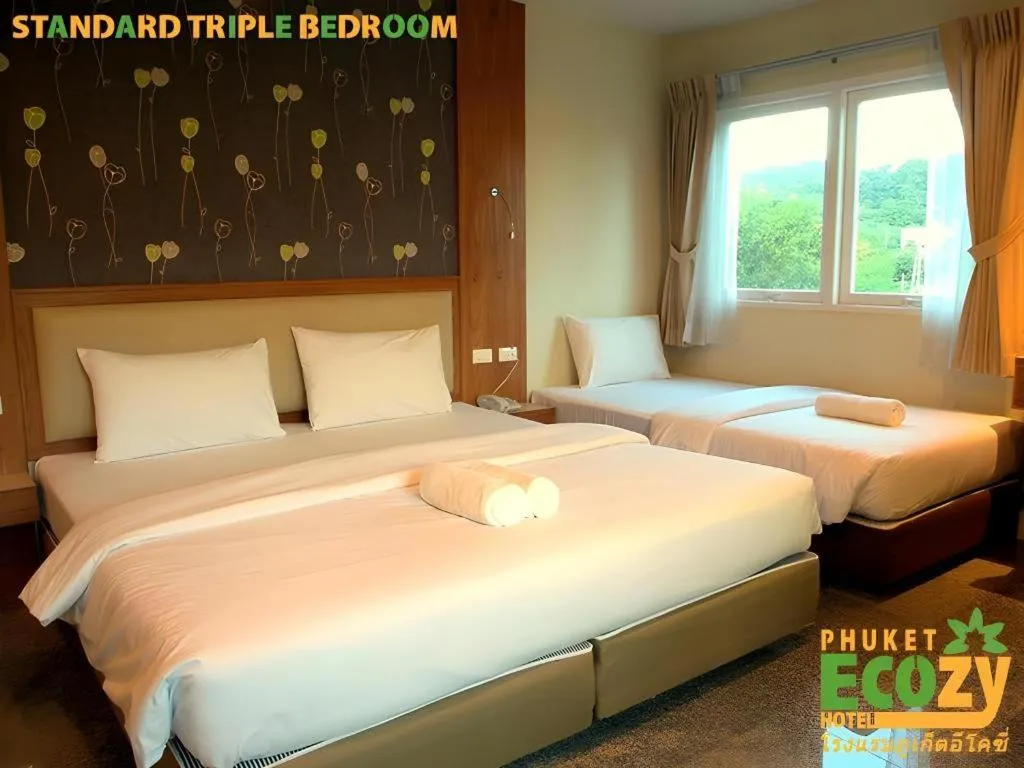 Bed in Phuket Ecozy Hotel