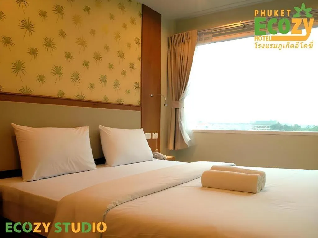 Bed in Phuket Ecozy Hotel