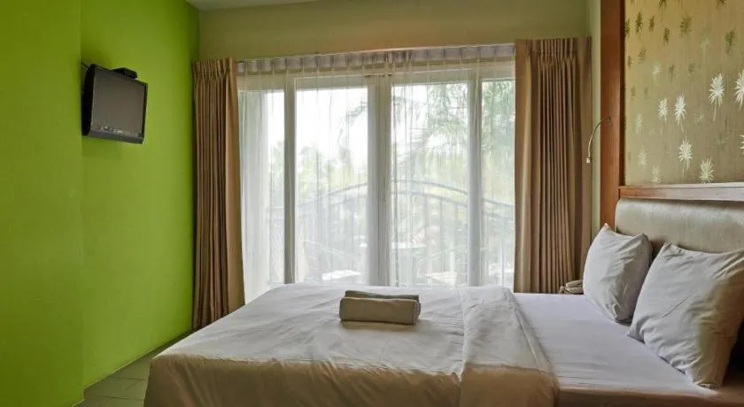 Bed in Phuket Ecozy Hotel