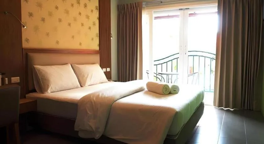 Bed in Phuket Ecozy Hotel