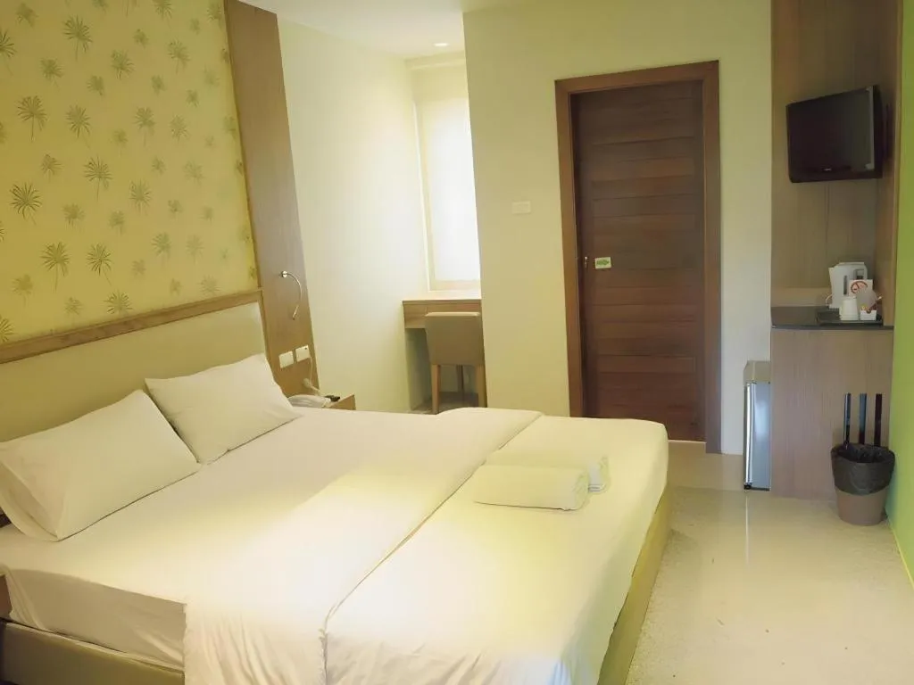 Bed in Phuket Ecozy Hotel