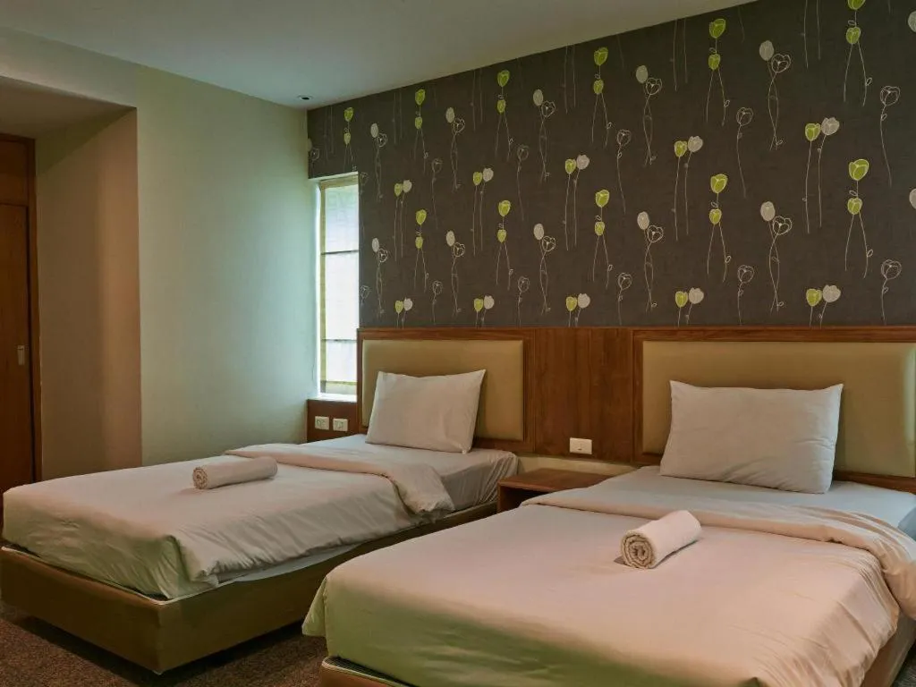 Bed in Phuket Ecozy Hotel