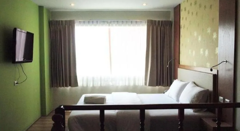 Bed in Phuket Ecozy Hotel