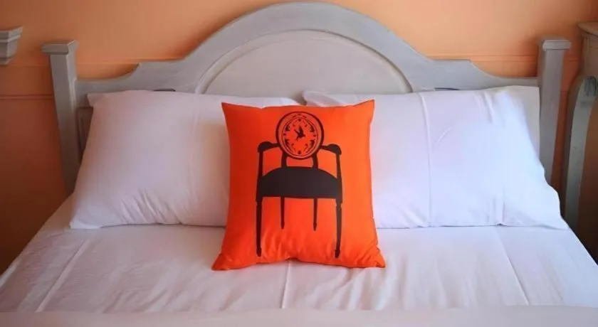 Bed in The Royal Chiangkhan Boutique Hotel