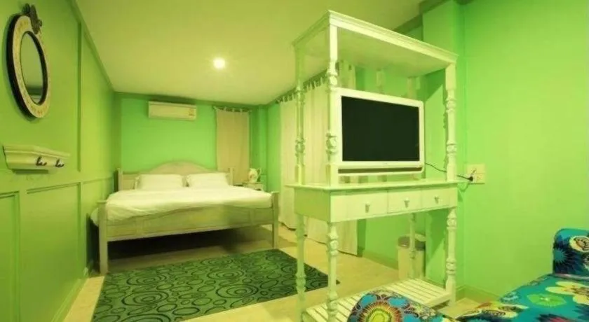 Bed in The Royal Chiangkhan Boutique Hotel