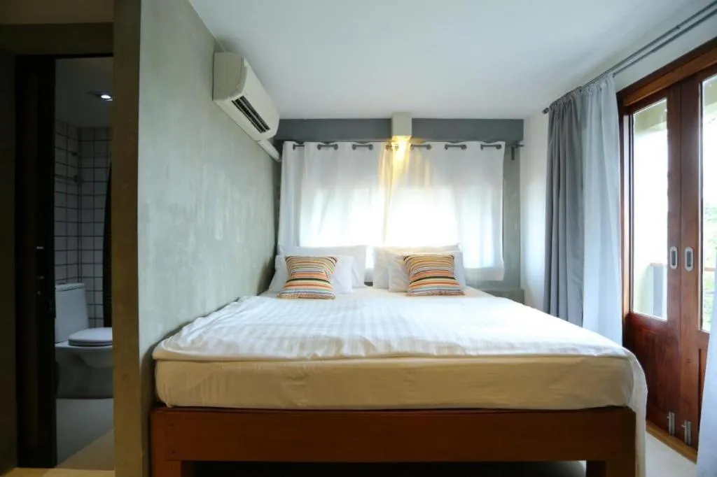 Bed in Chic Chiangkhan Hotel