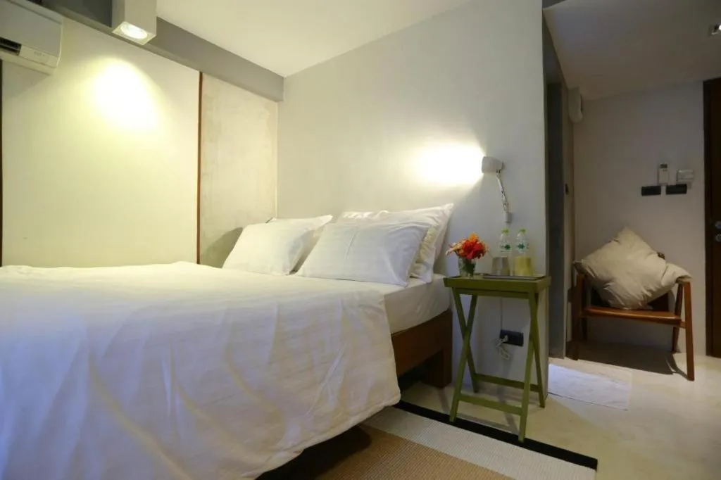 Bed in Chic Chiangkhan Hotel