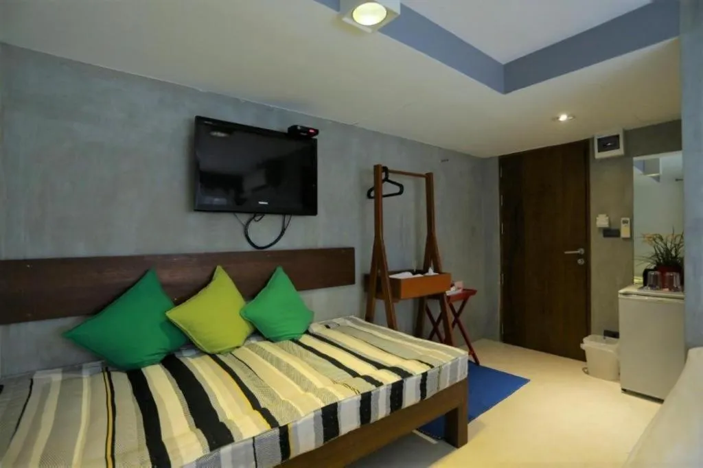 Bed in Chic Chiangkhan Hotel