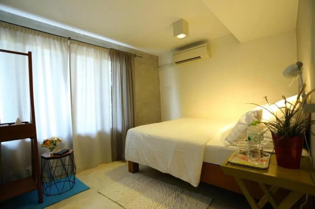 Bed in Chic Chiangkhan Hotel