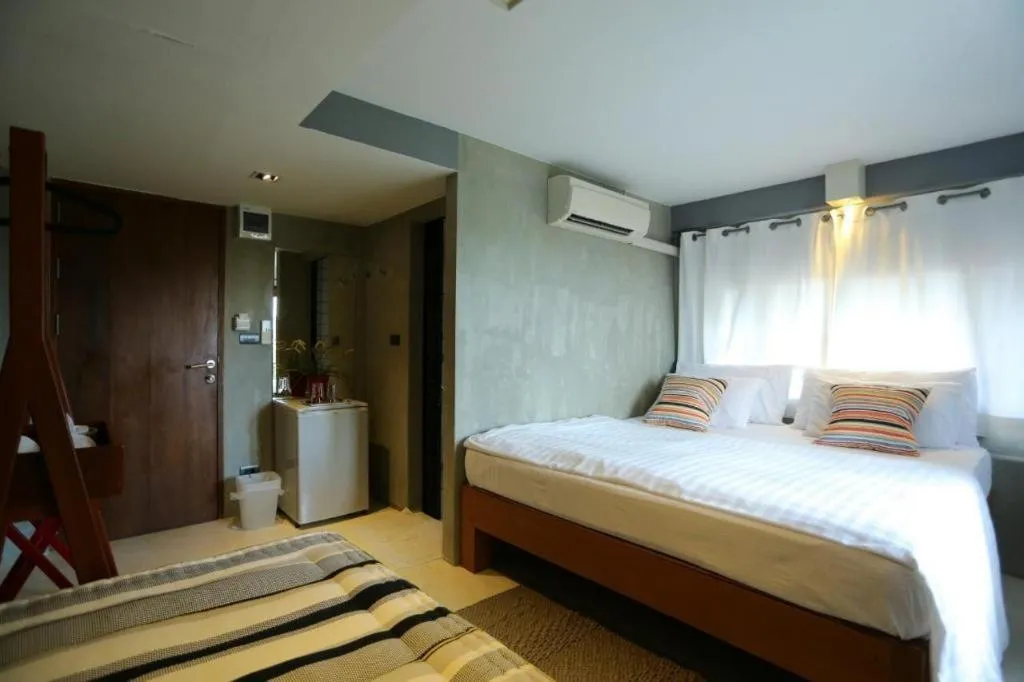 Bed in Chic Chiangkhan Hotel