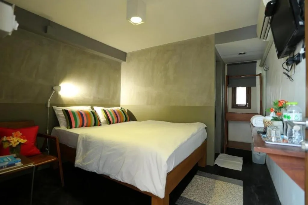 Bed in Chic Chiangkhan Hotel