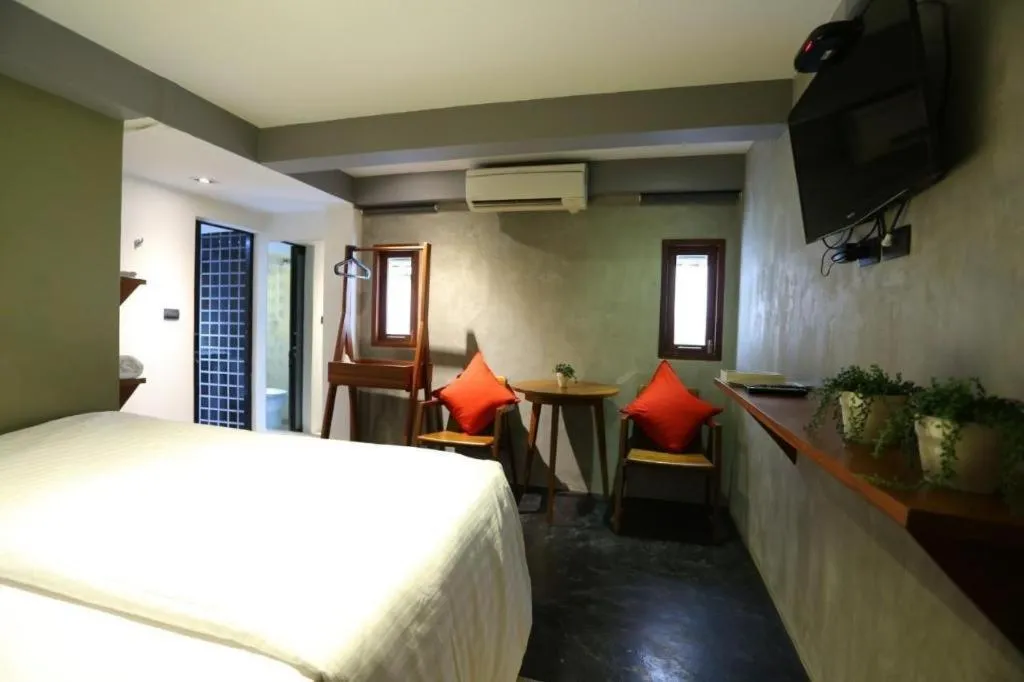 Bed in Chic Chiangkhan Hotel