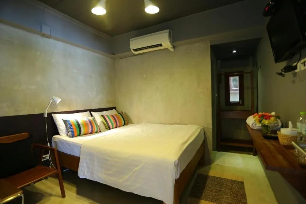 Bed in Chic Chiangkhan Hotel