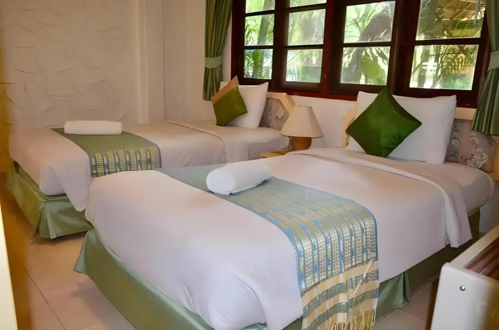 Bed in Sida Resort Hotel Nakhon Nayok