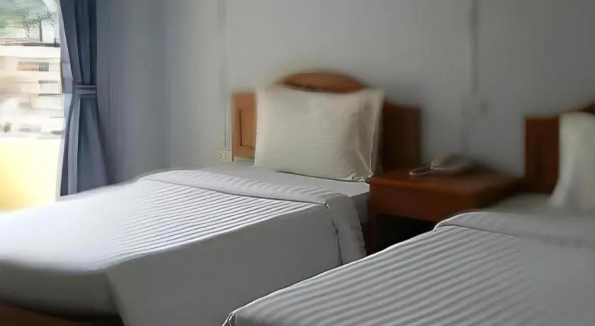 Bed in Ritzy House Hotel