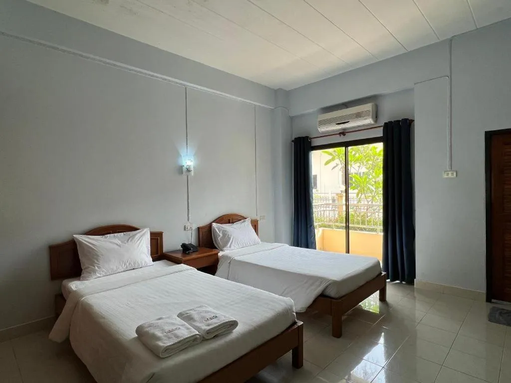 Bed in Ritzy House Hotel