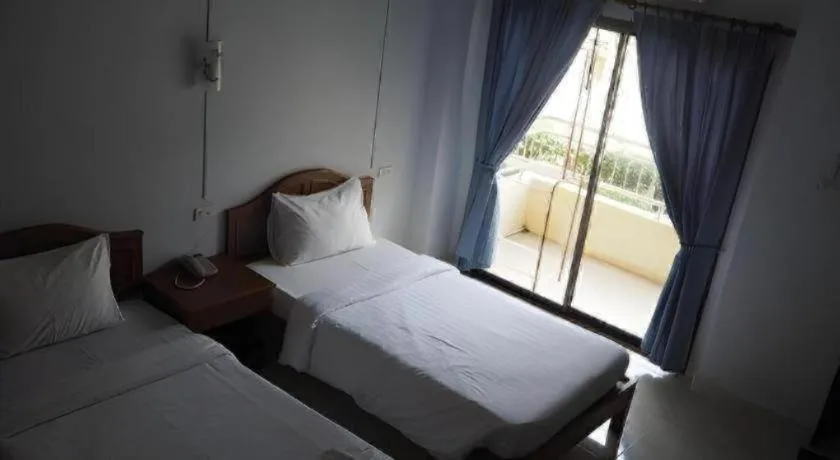 Bed in Ritzy House Hotel