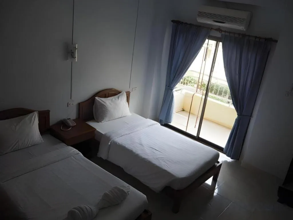 Bed in Ritzy House Hotel