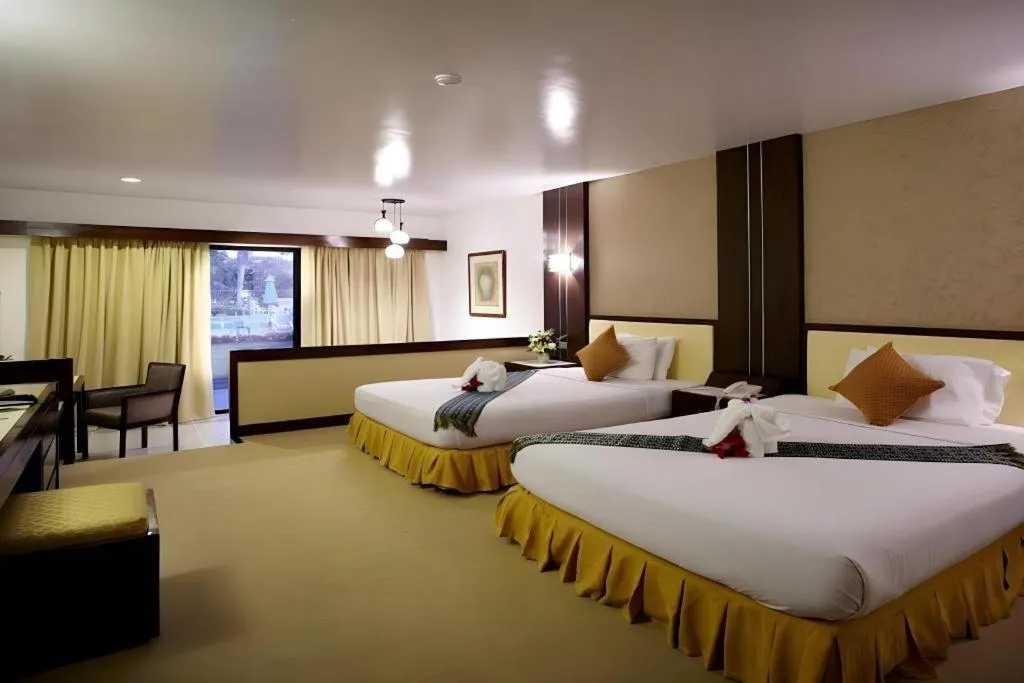 Bed in Pinehurst Golf Club and Hotel