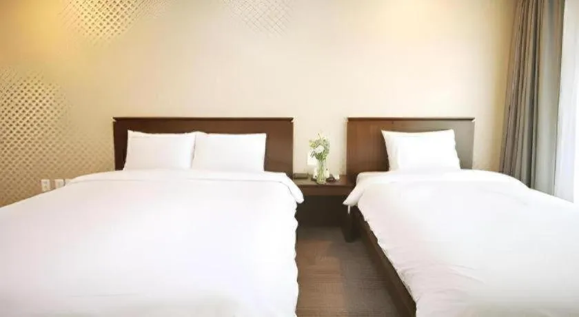 Bed in Sea View Hotel