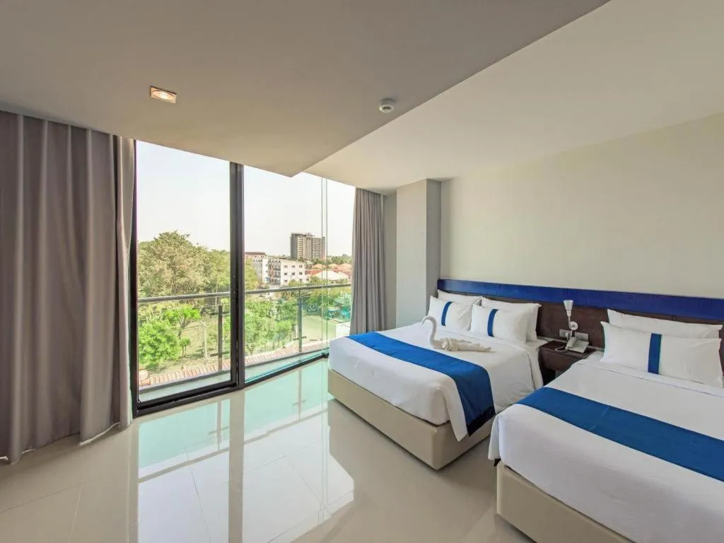 Bed in Ingtara Hotel