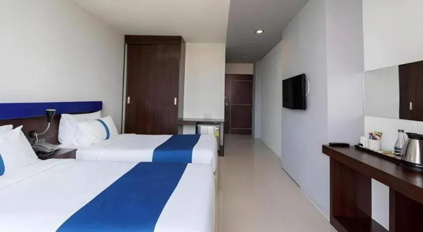 Bed in Ingtara Hotel