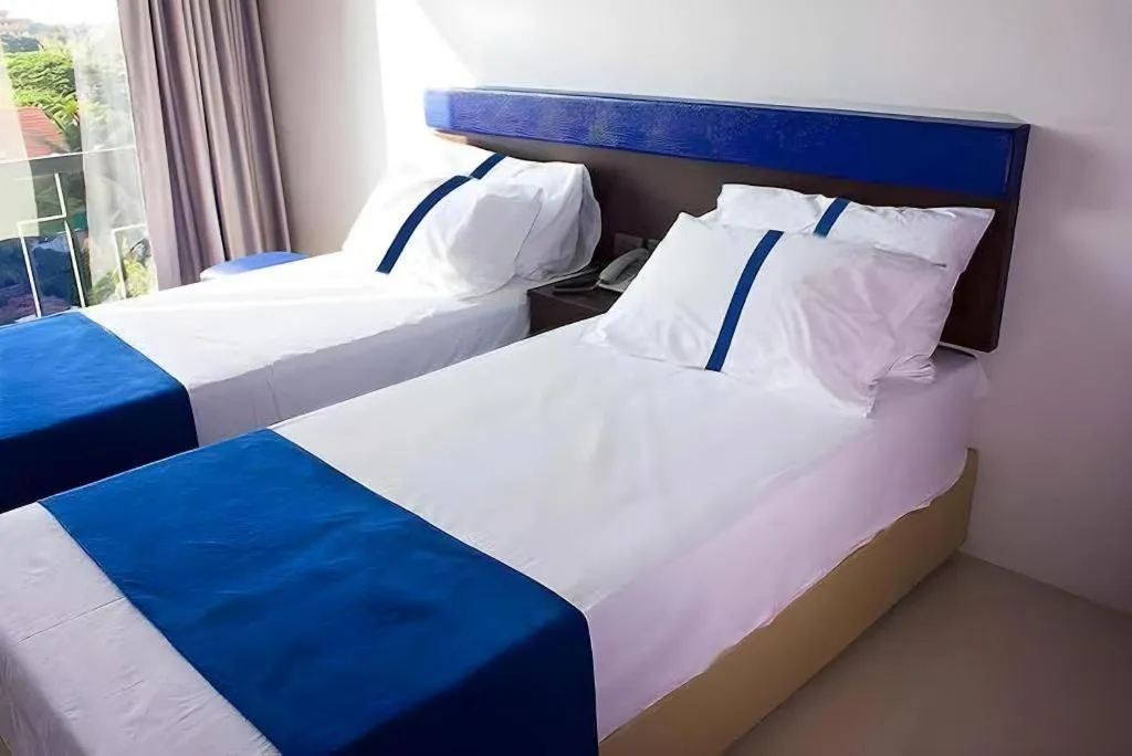 Bed in Ingtara Hotel